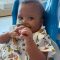 baby Zara smiling